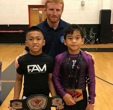 Class on the blue mats